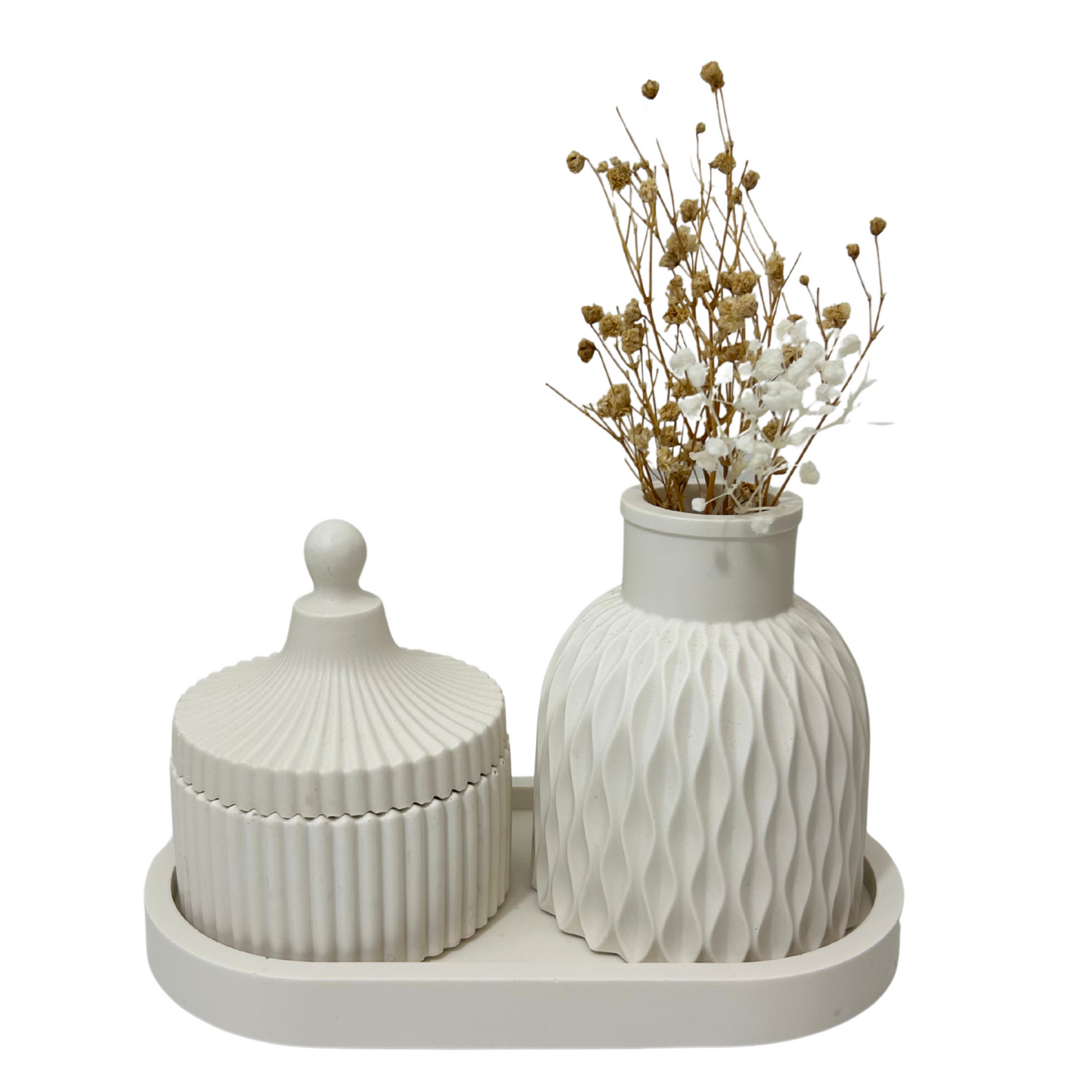 White ceramic Jesmonite decorative elements on a white background