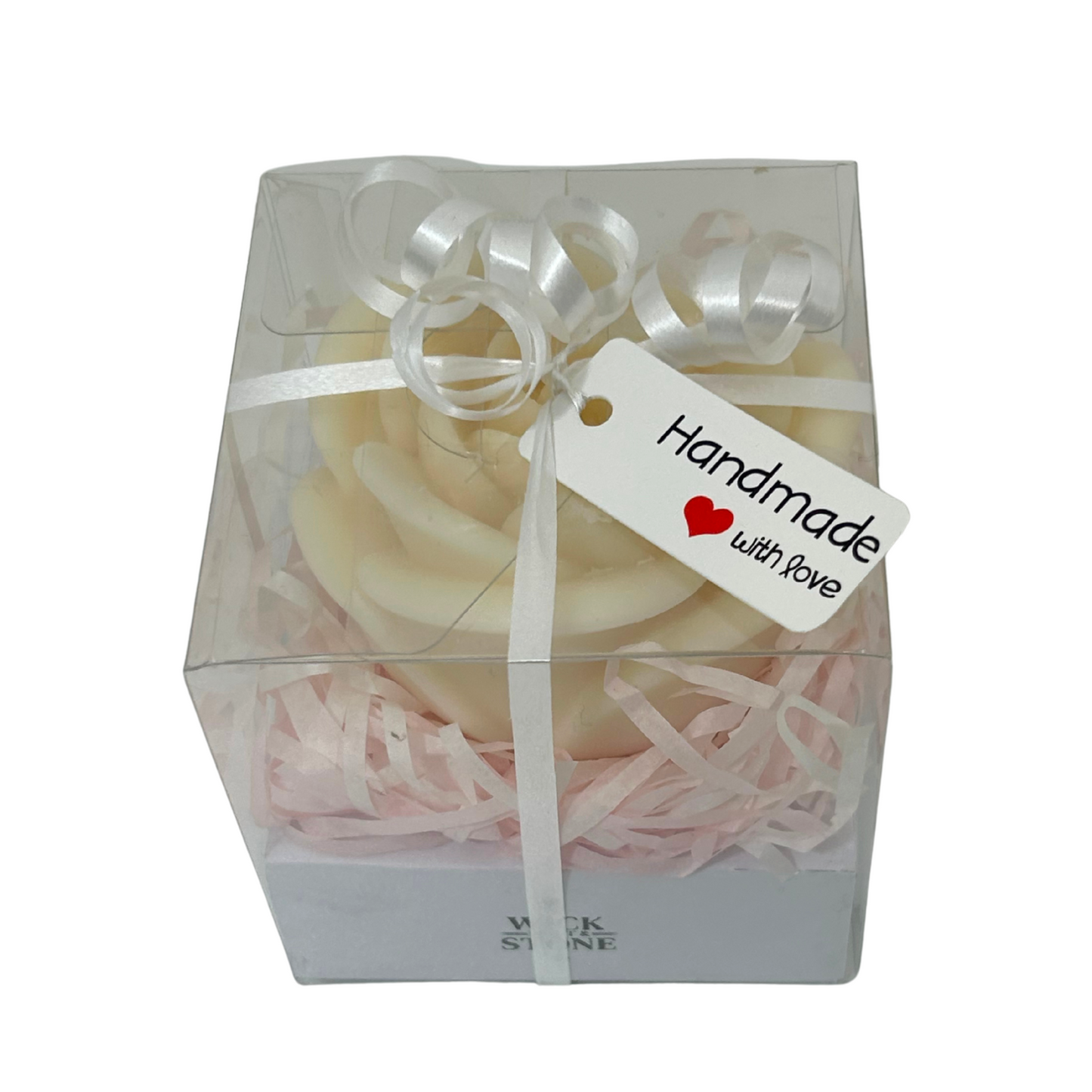 Candle in a box with a 'Handmade with Love' tag on a white background