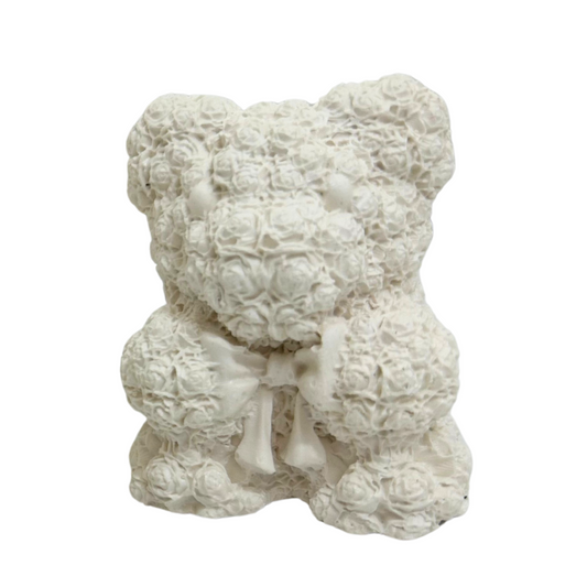 Jesmonite stone textured rose bear figurine on a white background