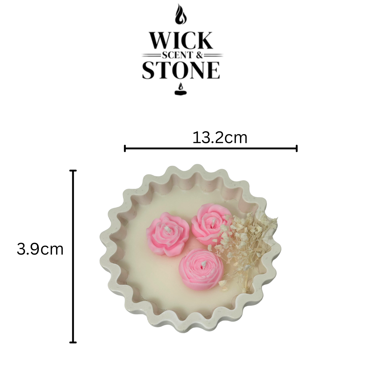 Candle jar  pink floral designs and measurements, branded 'Wick Scent & Stone'.