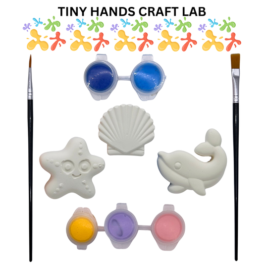 Craft supplies including paint, brushes, and sea-themed figurines with 'Tiny Hands Craft Lab' branding.